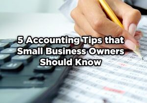 text: 5 accounting tips that small business owners should know. Background graphic - accountants hand working on spreadsheet in front of a keyboard