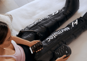 Woman wearing Normatec boots